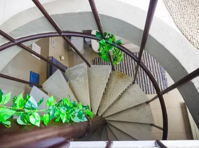 a bunch of plants in a spiral staircase at The Castello at Kruger in Marloth Park
