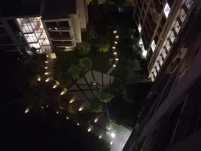 an overhead view of a city at night with lights at Menlyn Maine Trilogy Apartment 509 in Pretoria