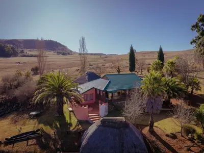 an aerial view of a house in a field at Moopong Farm House in Dullstroom