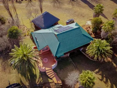 an overhead view of a house with a roof at Moopong Farm House in Dullstroom
