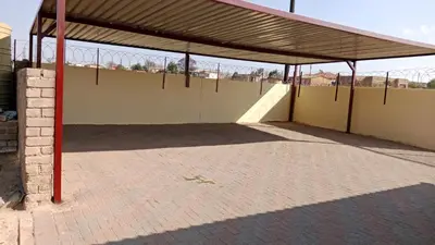 a building with a roof with a skateboard ramp at NEMARA Self Catering Lodge in Polokwane