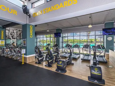 a gym with treadmills and cardio equipment in a building at 1368 The Blyde Crystal Clear 1 Bedroom Apartment in Pretoria