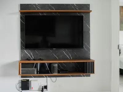 a flat screen tv hanging on a wall at 1253 The Blyde Crystal Clear 3 Bedroom Garden Apartment in Pretoria