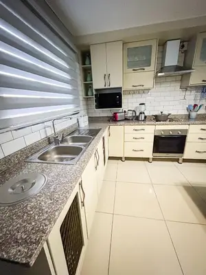 a kitchen with a sink and a counter at Mjejane Debs guest house in Hectorspruit