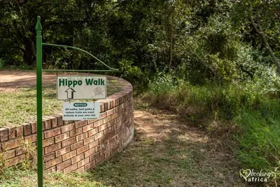 a brick wall with a sign that saysippi walk at Kruger Park Lodge Unit No. 254 in Hazyview