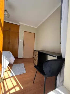 a room with a desk and a chair in it at Ka Tembe Self Catering Lodge in Polokwane