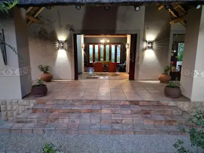 aoyer of a house with a staircase leading to the door at 203 Zebula - 5 Bedroom 20 sleeper in Mabula