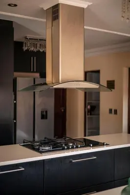 a stove top oven in a kitchen with at White River Country Estate - Self Catering - AMH Home in White River