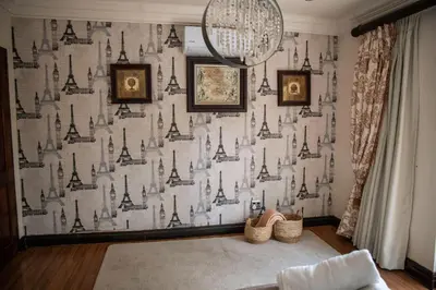 a room with a wall with a castle wallpaper at White River Country Estate - Self Catering - AMH Home in White River