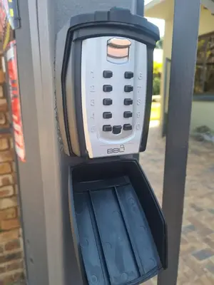 a cell phone in a pay phone booth at Stay@Walter in Pretoria