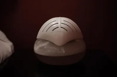 a close up of a white object on a table at Yalla Yalla Boutique Hotel in Witbank
