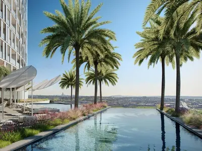 a view of a pool with palm trees at Luxurious Apartment, Ellipse, Waterfall, Midrand in Midrand