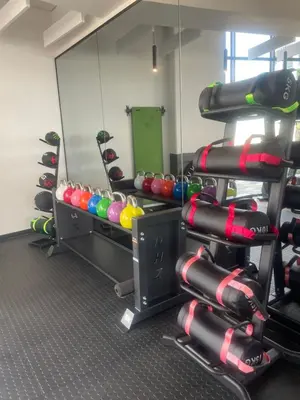 a gym with a rack of balls and a mirror at Ellipse Waterfall luxurious unit in Midrand