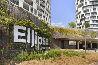 a sign on the side of a building at Ellipse Waterfall 3902 in Midrand