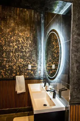 a bathroom with a sink and a mirror at Mekete Boutique & Events in Polokwane