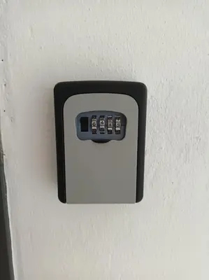 a black electrical outlet on a white wall at The Blissful Abode by BK Hospitable in Midrand