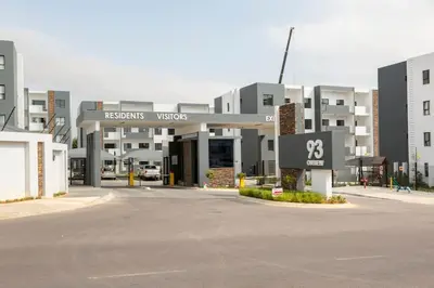 an empty parking lot in front of a building at The Blissful Abode by BK Hospitable in Midrand