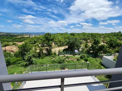 a view from the balcony of a house at La Chambre Manor House in Nelspruit