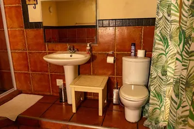 a bathroom with a toilet and a sink at Bay View 9 at Harties Lodge - Meerhof in Hartbeespoort