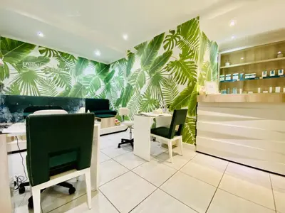a restaurant with green plants on the wall at 1 Bed in Waterfall - Book 4 & Get 5th Night FREE in Midrand