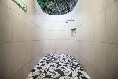 a building with a circular window on the wall at Villa Amor in Pretoria