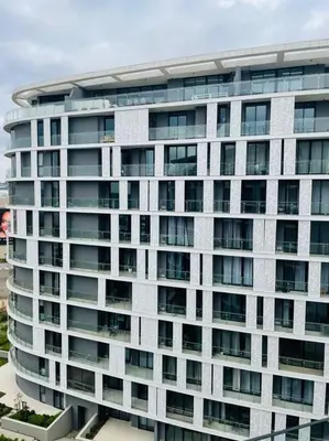 a large white building with many windows at Ellipse Waterfall Luxury Apartment in Midrand