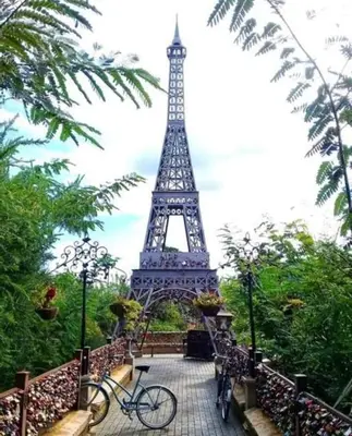a bike parked in front of the eiffel tower at The Holiday House Harties in Hartbeespoort