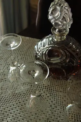 two wine glasses sitting on top of a table at Kwaggaskop Farm Kliphuis in Dullstroom