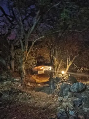 a night time picture of a boat in the woods at Ndlovu Bushvilla at Elephant Rock Eco Estate in Mica