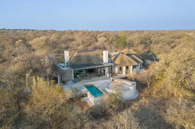 an aerial view of a house with a swimming pool at Villa Lanterfant - luxury stay in nature - solar powered in Hoedspruit