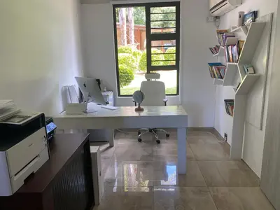 an office with a desk with a computer on it at Bridgelamour Guest House in Hartbeespoort