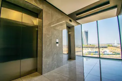 an empty lobby with a view of a city at Beautiful Gem at Ellipse in Midrand