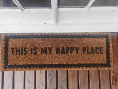a sign that says this is my happy place on a door at White River Stay in White River