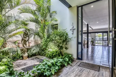 an indoor garden in a house with plants at 2 Lanner holiday home in Hartbeespoort
