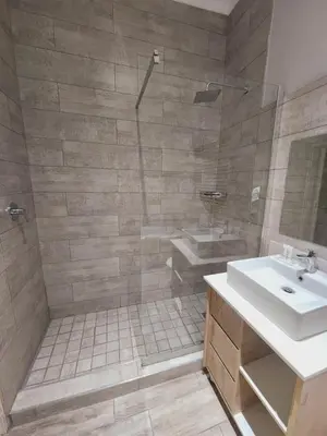 a bathroom with a sink and a shower at KB Guesthouse in Groblersdal