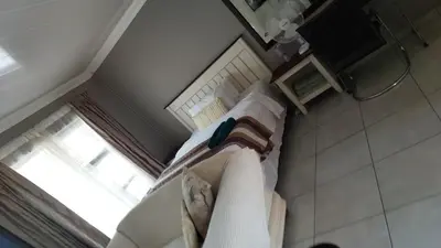 an overhead view of a bathroom with a bed and a window at Tenlet guesthouse in Pretoria