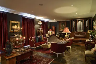 a living room filled with lots of furniture at Duke & Duchess Boutique Hotel in Pretoria