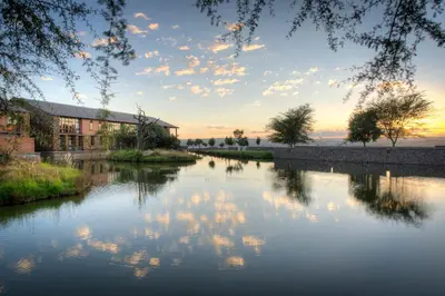 a view of a river at sunset at Riboville Boutique Hotel And Restaurant in Midrand