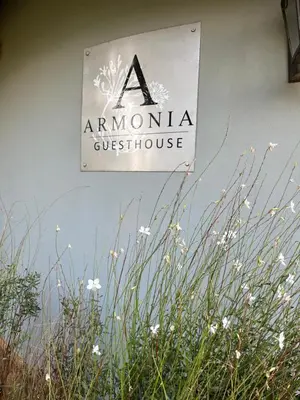 a sign on the side of a amontanautschebestosbestosbestos at Armonia in Ermelo