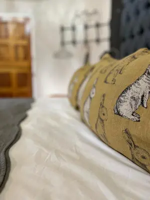 a row of pillows on top of a bed at Armonia in Ermelo