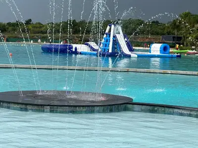a water park with a water slide in the water at The Blyde Crystal Lagoon in Pretoria