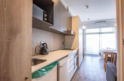 a kitchen with a sink and a counter top at Menlyn Maine Trilogy Apartment 611 in Pretoria