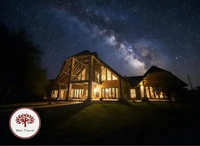 a house under the milky way at night at Zebula Golf and Wildlife Estate - Nights Sky Pax 16 - Moi Signature Luxury villa in Mabula