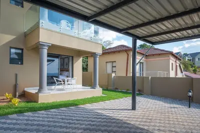 a view of a house with a patio at Utopia on the Rock2 in Nelspruit