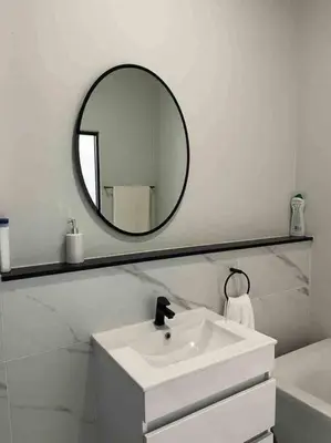 a white bathroom with a sink and a mirror at Executive Penthouse in Midrand, Waterfall City - Fast WiFI and Secure Parking - 3 Elizabeth Place in Midrand
