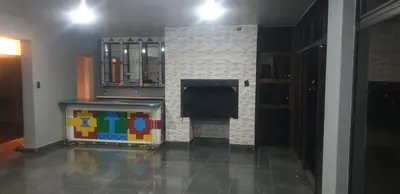 a room with a fireplace with a table and a mirror at The Concept in Centurion