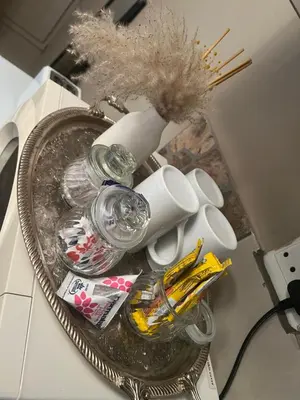 a silver tray with glasses and other items on a counter at 17 Byvanger Luxury Home Deluxe Queen Suite Room 1 in Centurion