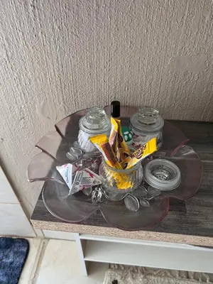a glass table with food and drinks on it at 17 Byvanger Luxury Home Deluxe Queen Suite Room 1 in Centurion