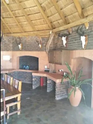 a kitchen with cows on the wall of a building at Marocco Lodge in Baltimore