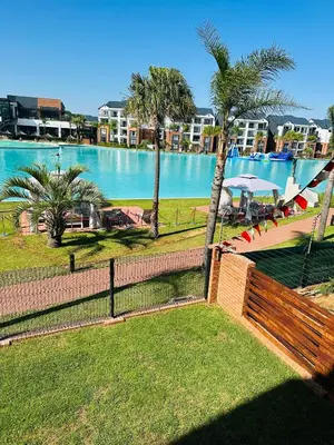 a view of a river with a boat in it at Lagoon facing The Blyde in Pretoria